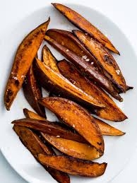 Roasted Sweet Potatoes With Garlic And Chile Recipe Roasted Sweet Potatoes Sweet Potato Recipes Roasted Roasted Whole Sweet Potatoes