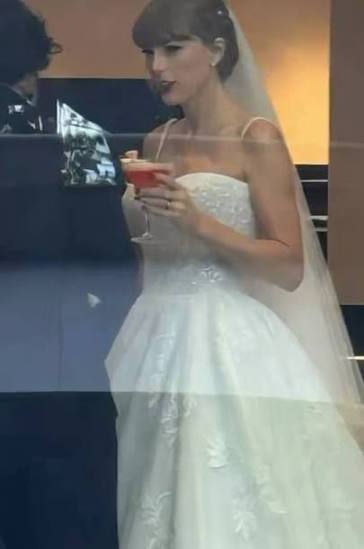Taylor Swift on her Wedding Dress: GORGEOUS in WHITE
