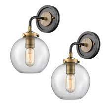 The tub is by jacob delafon, with fittings by water supply, the sconces are by niermann weeks, and the veere grenney chair is covered in an armani/casa textile. Wildsoul 40041ab 2 Modern Farmhouse 1 Light Globe Sconce Armed Brass Bathroom Sconces Clear Glass Vanity Wall Lighting Fixtures Oak Wood And Brass Parts Matte Black And Brass Finish Pack Of 2 Amazon Com