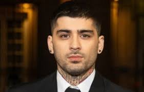 Who is Jon Batiste and what's his net worth?