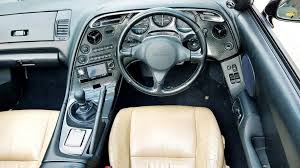 This cars interior looks like it came straight off the toyota dealership in 1989, aside from the corbeau clubman bucket seat, nardi classic steering wheel, and broadway mirror. Toyota Supra Toyota Supra A80 Interior