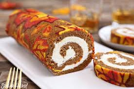 Patterned Pumpkin Roll A Moist Pumpkin Cake With A Pumpkin Spice Cream Cheese Filling Is Decorated With A G Pumpkin Roll Pumpkin Rolls Recipe Jelly Roll Cake