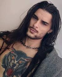 Stylish Long Hair for Men with Chest Tattoos