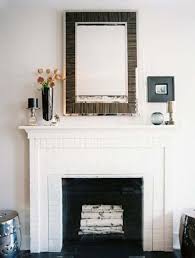 Birch Logs For Fireplace Display What To Know About Styling A Mantel Display Brick Fireplace Painted Brick Fireplaces Home