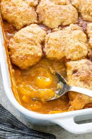 How to make peach cobbler with spiced peaches and a biscuit top. Peach Cobbler Recipe Video Jessica Gavin