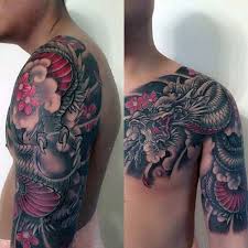 Black And Red Japanese Sleeve Tattoo Red And Black Traditonal Japanese Dragon Mens Half Sleeve And Chest Tattoos Tattoo Designs Men Dragon Tattoo Dragon Tattoo Chest