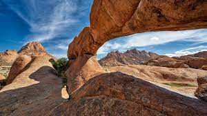 Remnant of a ring complex that has extensively occurring miarolitic cavities with superb crystals. The Arch At Spitzkoppe Mountain Landscape Of Granite Rocks Matterhorn Of Namibia Windows 10 Spotlight Images