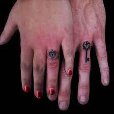 Couple tattoo heart married couple tattoos heart tattoo. Lock N Key Tattoo Designs Tattoo Design Tattoo Ideas Ring Tattoo Designs Tattoo Wedding Rings Ring Tattoos