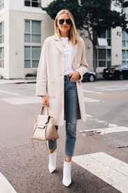 What to wear with leather leggings and ankle boots? Blue Ripped Jeans With White Ankle Boots Spring Outfits 2 Ideas Outfits Lookastic