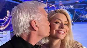 Phillip Schofield plants kiss