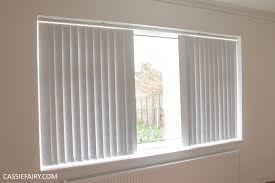 Because they hang vertically, vertical blinds collect less dust, making them easier to maintain. Living Room Makeover Diy Decorating Venetian Vertical Blinds Home Interior Design Decor 14 My Thrifty Life By Cassiefairy