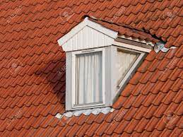 An attic not only adds interest to roof line of your house, you can add a little. Dormer Window On A Red Tile Roof Stock Photo Picture And Royalty Free Image Image 19830354