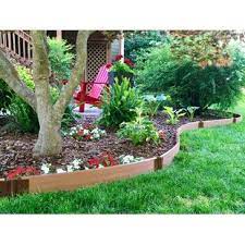 Check out wood lawn edging on ebay. Wood Landscape Edging Wayfair