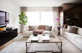 25 Living Rooms With Oversized Coffee Tables Chairish Blog Oversized Coffee Table Coffee Table Leather Couches Living Room