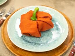 How to fold napkins for thanksgiving. How To Fold Festive Pumpkin Napkins The Kitchen Food Network Food Network