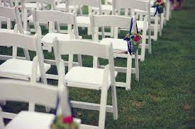 Add elegance and charm to your event with white garden folding chairs. White Folding Chairs For Outdoor Wedding Ceremony With Pew Buckets Navy Pink Michigan Wedding Photography Outdoor Wedding Ceremony White Folding Chairs
