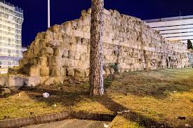 The outline of the remains of the servian wall can be spotted at numerous locations throughout today's rome. Servian Wall And Gates