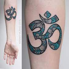 35 Tattoos That Show A Serious Commitment To Fitness Om Tattoo Trendy Tattoos Om Tattoo Design