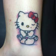 Some really gorgeous hello kitty tattoos. Naughty Hello Kitty Tattoo On Leg Jpg 612 612 Hello Kitty Tattoos Cat Tattoo Hello Kitty