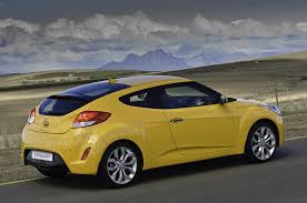 The 2013 hyundai veloster is a stylish hatchback with a unique design and a punchy powertrain. Images Hyundai Veloster 2013