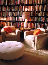 I Love This Library Set Up Two Cozy Chairs A Table To Set The Coffee Hold A Lamp And A Soft Ottoman To Plop My My Ideal Home Home Libraries