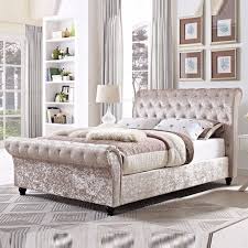 Thickly cushioned and upholstered on all sides, it's detailed with decorative bronze nailheads along the sides of the headboard and footboard. King Size Astral Sleigh Bed Frame Soft Touch Beds