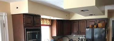 You can try just some crown moulding at the top like in marsi and robert's kitchen above. Can You Remove Your Kitchen Soffit 4 Careful Considerations Riverside Construction