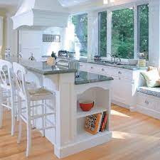 They can accommodate lots of appliances, tableware, dishes if you have a big kitchen island, if it's built up of several rectangles, you may place a seating or dining area right inside it, it will be a very cozy and. This Is The Basic Idea For Kitchen Counter Raised Breakfast Bar And Built In B Traditional Kitchen Design Kitchen Island With Seating Interior Design Kitchen