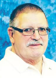 James E. Brunswick, 74
