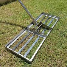 Relieve the compaction and aerate the soil by pushing a garden fork about 10cm deep into the soil every 10cm and gently rocking back and forth on the fork handle. Levelling Lawn Rake Tool Uk Fast Free Express Dhl Delivery