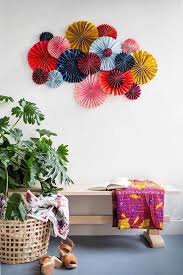 Colourful Paper Fans Arranged Together Over A Wooden Bench Girl Room Decor Ideas Blue Floor Diy Wall Diy Wall Decor Cute Wall Decor