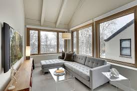 Turn The Sunroom Into A Relaxing Tv Room Design Ben Ganje Partners Small Tv Room Sofa Design Family Room Design