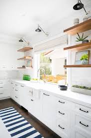 You can also choose from modern, contemporary, and industrial. Blue Awning Stripe Runner In Front Of Farm Sink Transitional Kitchen