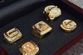 The first tribute is a snake wrapped around each player's jersey number on the side of the ring. On Sale Kobe Bryant Los Angeles Lakers 5 Replica Nba World Championship Rings 1810808523