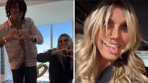 AMA viewers are left baffled as Heidi Klum tries to pull Benson Boone's  trousers down