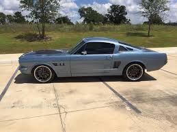 built by ringbrothers john s 65 mustang is powered by a 408ci windsor v8 fueled by a holley 650 carb and rides on global mustang cars mustang classic mustang pinterest