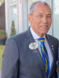 Arriba a Nueve de Julio Alberto Giménez, Gobernador del Club de Leones