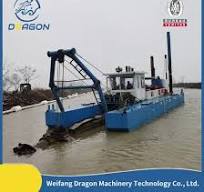 Dredge à aspiration avec tête de coupe à tarière, plus ...