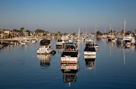 Newport beach is a town in california with a population of 86,280. Boating With Bogie And Bacall
