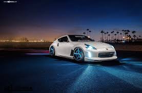 Nissan 370z On Air Bags And Blue Avant Garde Rims Nissan 370z Nissan Car