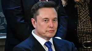 Musk calls Sen. Kelly a 'traitor' over trip to Ukraine, Kelly hits back