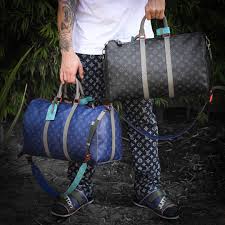 Black And White Louis Vuitton Duffle Bag Deconstructed The Limited Edition Blue Kim Jones Louis Vuitton Keepall Rebuilt It With A Black E Louis Vuitton Keepall Louis Vuitton Duffle Bag Louis Vuitton