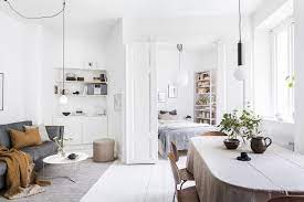 Every part of this small living room is furnished which is, paradoxically, why it doesn't look cluttered. Minimalist Design Tips How To Make A Small Space Look Bigger The Lifestyle Files Small Space Living Room Ikea Living Room Small Space Living
