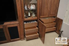 This split drawer hidden compartment offers one more way to hide valuables. Arizona Custom Entertainment Centers Lift Stor Beds