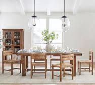 Classic pedestal base round dining table with integral extension leaf that sits neatly within the table when not in use. Wood Dining Table Seats 10 Pottery Barn