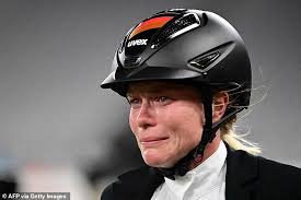 Annika schleu of germany cries after failing to guide her horse in the show jumping at the tokyo olympics. Aip2tw I4sf6pm