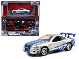 First car better be a charger, jack.you mean skyline.. Fast Furious Build N Collect Brian S Nissan Skyline Gt R R34 1 55 Scale Die Cast Kit