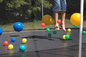 Trampoline games are not only a fun way to exercise, it is a way to develop coordination, body control and the balls should be smallish, a couple of inches in diameter. You Can Play All Sorts Of Ball Games On Your Springfree Trampoline Kids Fun Learning Trampoline Backyard Fun