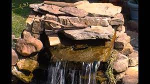 The waterfall and stream actually begins at the waterfall weir. Diy Pond Waterfall Diffuser Spillway Youtube