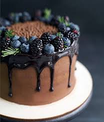 Beautiful Rustic Chocolate Drippy Cake See How The Blue Hues From The Berries Are Reflected In The Shiny Chocolate Ganache Drippy Cakes Cake Recipes Desserts